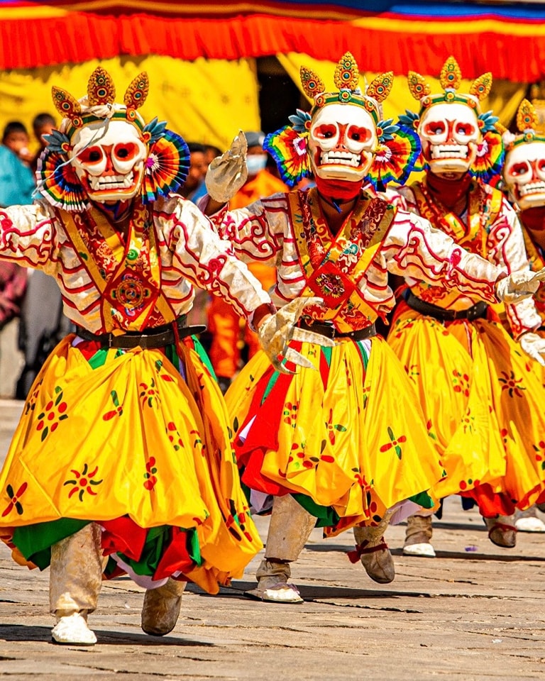 Traditional Bhutanese dance during Thimphu Tsechu Festival Tour